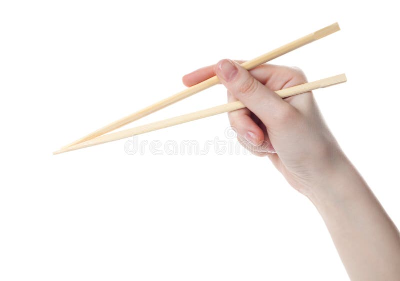 Το χέρι κρατά chopsticks στοκ φωτογραφίες με δικαίωμα ελεύθερης χρήσης