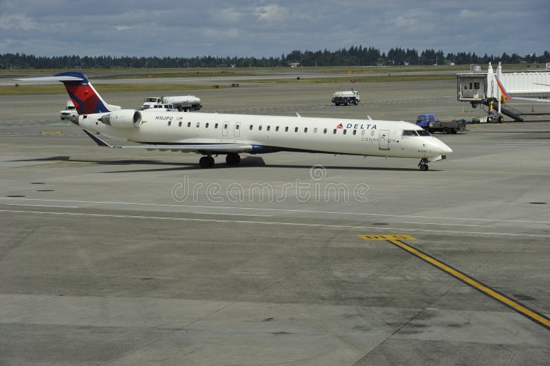 Bombardier CRJ-900ER of Delta Connections. For details about this airline please see: Photo taken at Seattle Airport, USA, on 30th May, 2013. Bombardier CRJ-900ER of Delta Connections. For details about this airline please see: Photo taken at Seattle Airport, USA, on 30th May, 2013