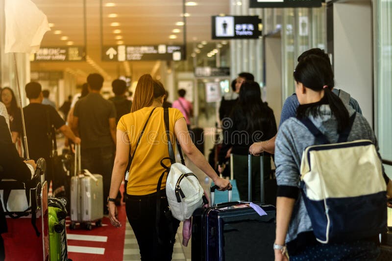 Tourists in airports in Morningstars. Tourists in airports in Morningstars