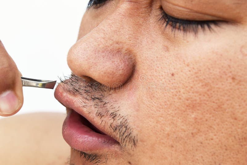 Τράβηγμα ατόμων mustache από τα τσιμπιδάκια στο άσπρο υπόβαθρο στοκ φωτογραφίες Τράβηγμα ατόμων mustache από τα τσιμπιδάκια στο άσπρο υπόβαθρο στοκ φωτογραφίες