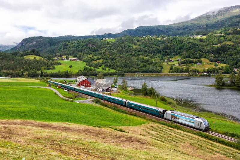 Seimsgrend, Norway - August 17, 2022: Train of Bergen Railway near Seimsgrend, Norway. Seimsgrend, Norway - August 17, 2022: Train of Bergen Railway near Seimsgrend, Norway