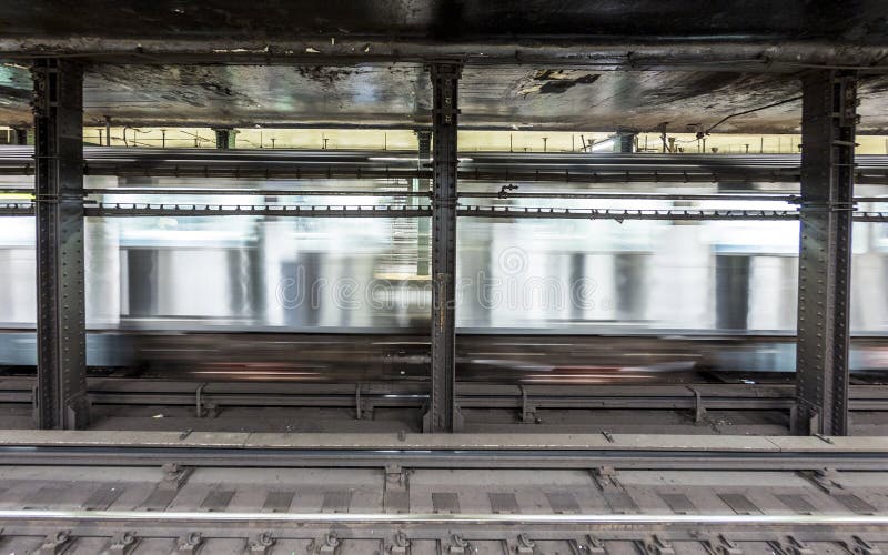 NEW YORK, USA - OCT 21 2015: train in subway stationAtlantc avenue in New York. With 1.75 billion annual ridership, NYC Subway is the 7th busiest metro system in the world. NEW YORK, USA - OCT 21 2015: train in subway stationAtlantc avenue in New York. With 1.75 billion annual ridership, NYC Subway is the 7th busiest metro system in the world.