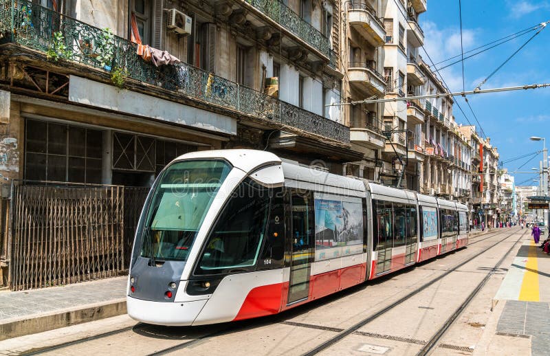 Oran, Algeria - May 12, 2018: City tram in the city centre of Oran. The Oran Tramway system has 32 stations on 1 line. Oran, Algeria - May 12, 2018: City tram in the city centre of Oran. The Oran Tramway system has 32 stations on 1 line