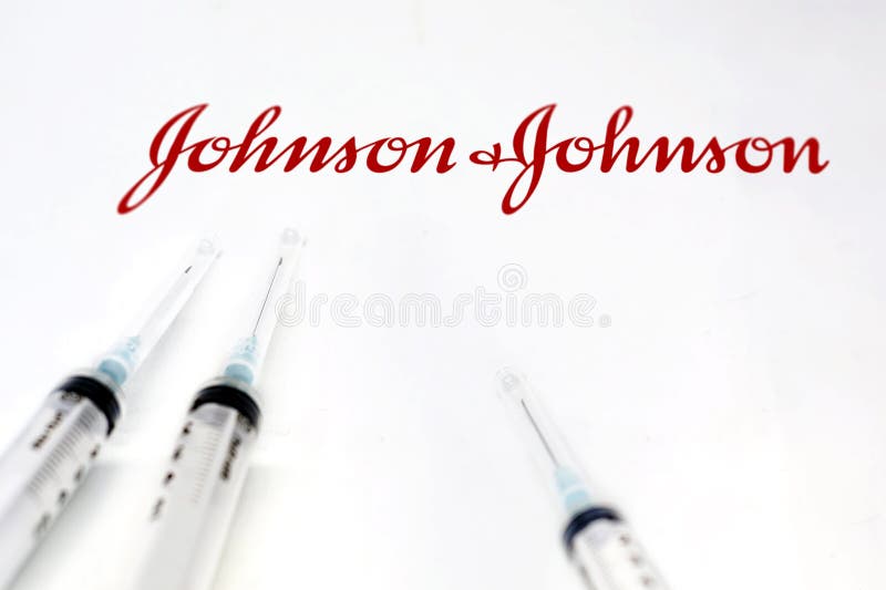 τρεις σύριγγες δίπλα στο πλαίσιο του εμβολίου johnson&19
