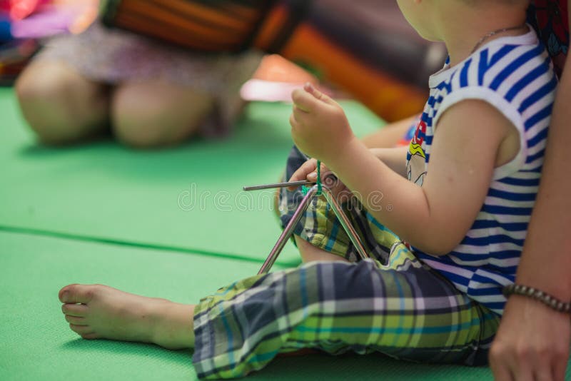 Triangle percussion musical instrument. Music lesson for children. Triangle percussion musical instrument. Music lesson for children.