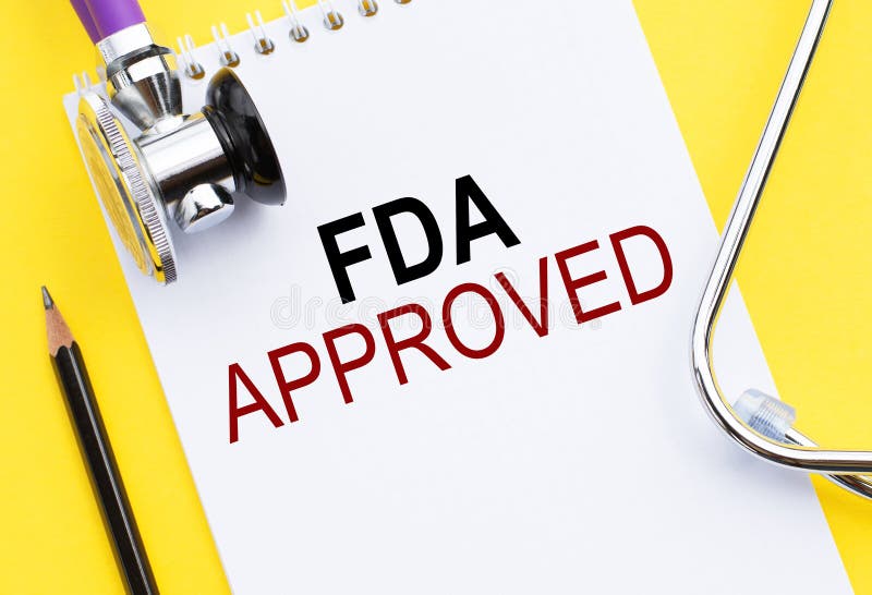 τρόφιμα fda και φαρμακευτική διαχείριση εγκεκριμένο κείμενο για την τεκμηρίωση κίτρινο στηθοσκόπιο. υγειονομική περίθαλψη ή ιατρικ στοκ φωτογραφία