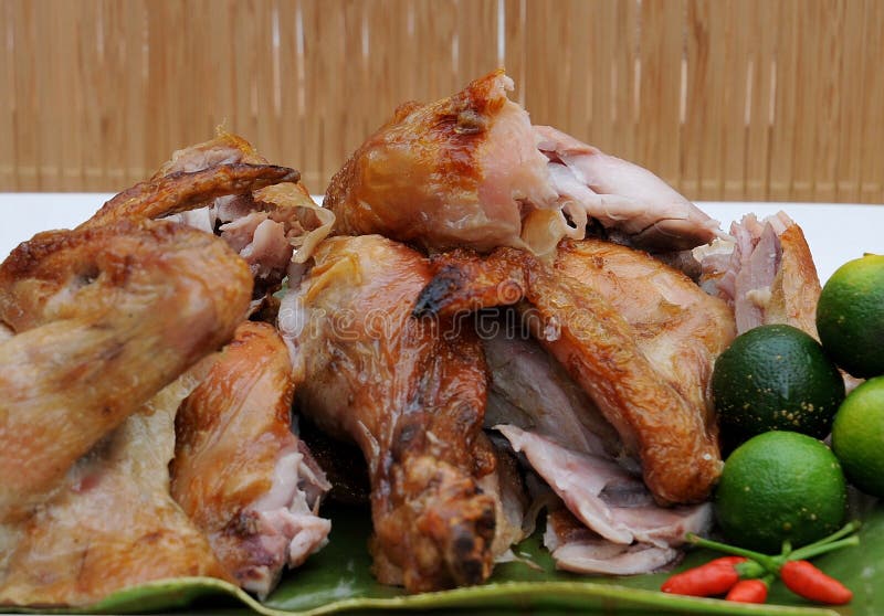 Τρόφιμα από τις Φιλιππίνες, Lechon Manok (ψημένο κοτόπουλο) στοκ φωτογραφίες με δικαίωμα ελεύθερης χρήσης Τρόφιμα από τις Φιλιππίνες, Lechon Manok (ψημένο κοτόπουλο) στοκ φωτογραφίες με δικαίωμα ελεύθερης χρήσης