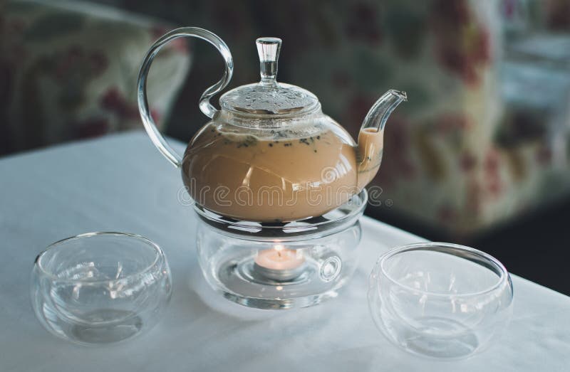 Τσάι Masala διαφανές teapot στοκ εικόνα Τσάι Masala διαφανές teapot στοκ εικόνα