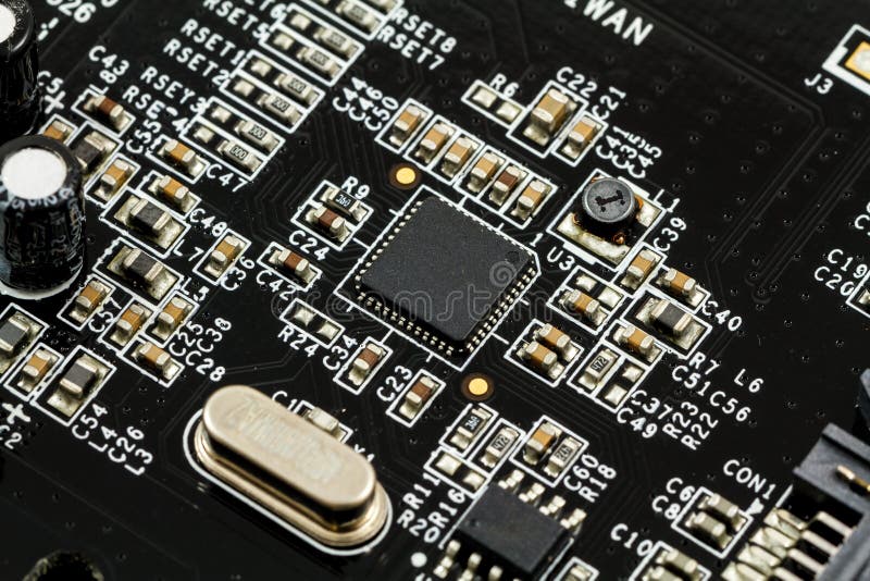 Τυπωμένος πίνακας κυκλωμάτων (PCB) με, ολοκληρωμένα κυκλώματα, πυκνωτές, και αντιστάτες στοκ εικόνες Τυπωμένος πίνακας κυκλωμάτων (PCB) με, ολοκληρωμένα κυκλώματα, πυκνωτές, και αντιστάτες στοκ εικόνες