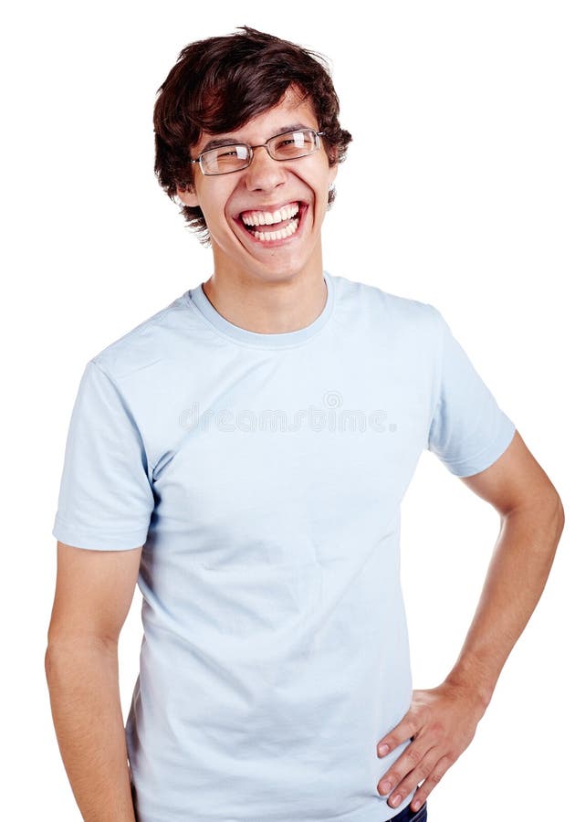 Portrait of young hispanic man wearing glasses, blue t-shirt and jeans standing with hand on his hip and loudly laughing isolated on white background - laughter concept. Portrait of young hispanic man wearing glasses, blue t-shirt and jeans standing with hand on his hip and loudly laughing isolated on white background - laughter concept