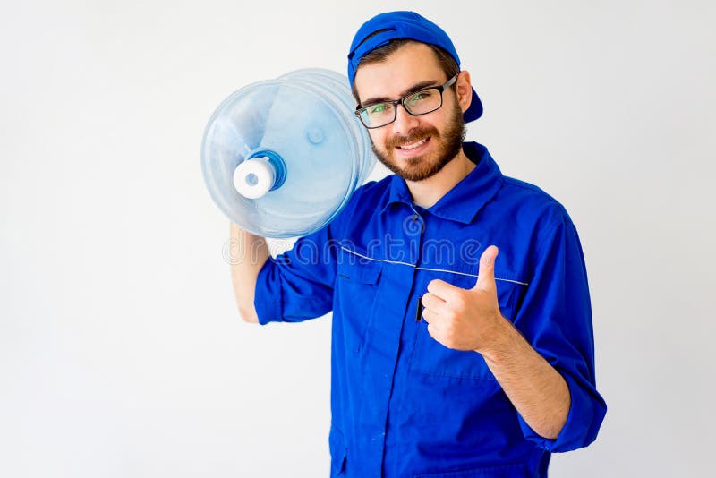 Water delivery service concept: a man with a bottle. Water delivery service concept: a man with a bottle