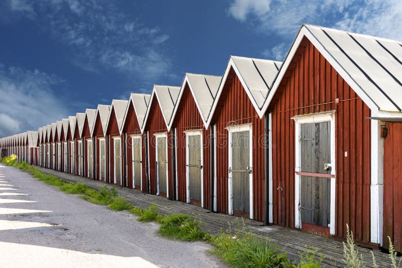 Υπόλοιπος κόσμος των παραδοσιακών boathouses στοκ εικόνες με δικαίωμα ελεύθερης χρήσης Υπόλοιπος κόσμος των παραδοσιακών boathouses στοκ εικόνες με δικαίωμα ελεύθερης χρήσης