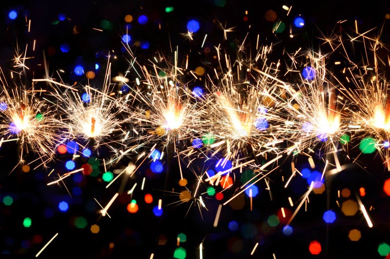 Υπόβαθρο με ένα sparkler στοκ εικόνα Υπόβαθρο με ένα sparkler στοκ εικόνα