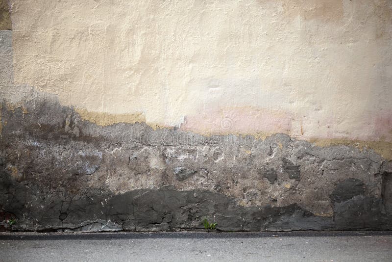 Υπόβαθρο πόλεων Grunge με τον παλαιό τοίχο