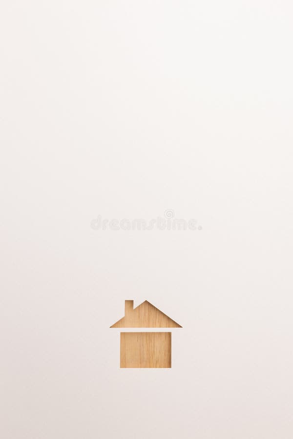 Υπόβαθρο του ξύλινου κατασκευασμένου βασικού εικονιδίου σπιτιών