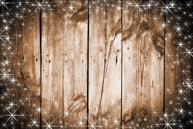 The brown wood texture with white snow and stars. Christmas background. The brown wood texture with white snow and stars. Christmas background