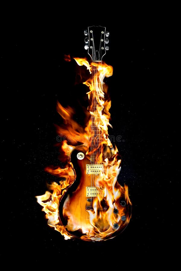 flaming electric guitar on black background. flaming electric guitar on black background