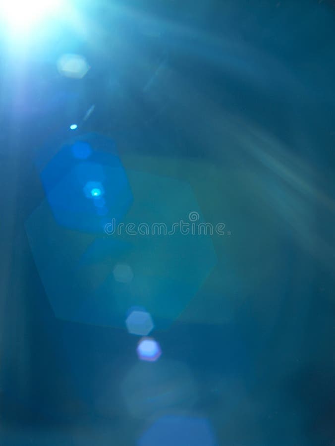 Abstract blue background with lens flare. Abstract blue background with lens flare