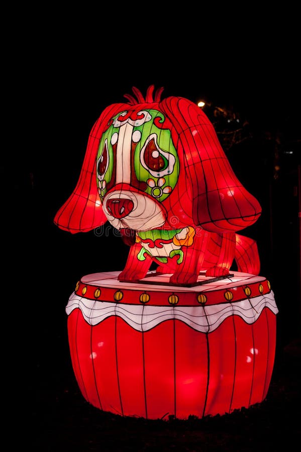 Tallinn, Estonia- December 25, 2019: Lantern in the shape of a symbol of the year - Dog. Chinese zodiac animals. Festival the of lights â€žThe Great Lanterns of China. ..Tallinn, Estonia- December 25, 2019: Lantern in the shape of a symbol of the year - Dog. Chinese zodiac animals. Festival the of lights â€žThe Great Lanterns of China