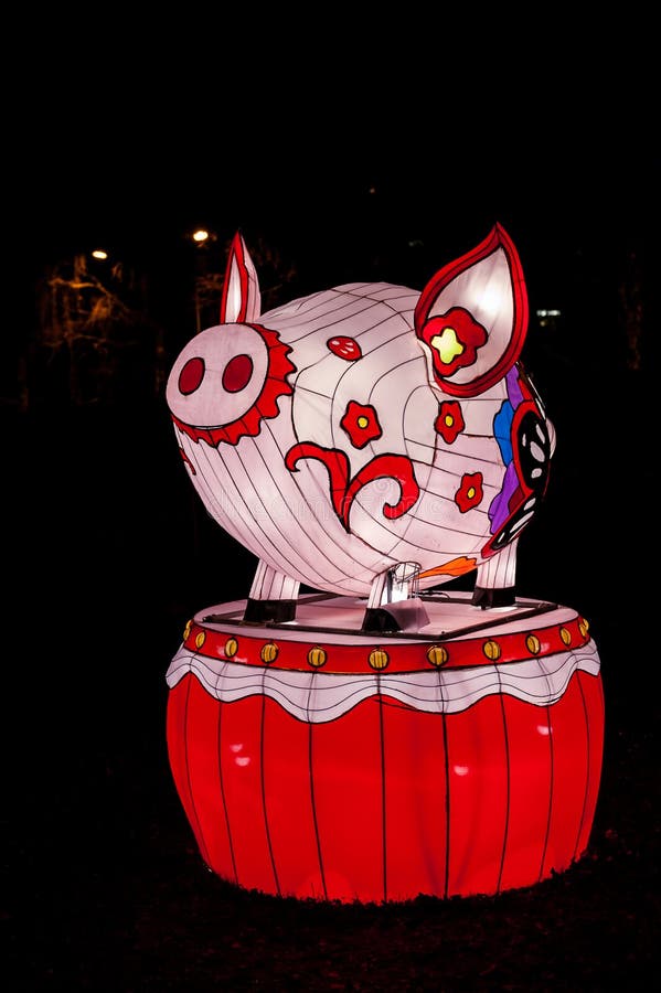 Tallinn, Estonia- December 25, 2019: Lantern in the shape of a symbol of the year - Pig. Chinese zodiac animals. Festival the of lights â€žThe Great Lanterns of China. Tallinn, Estonia- December 25, 2019: Lantern in the shape of a symbol of the year - Pig. Chinese zodiac animals. Festival the of lights â€žThe Great Lanterns of China
