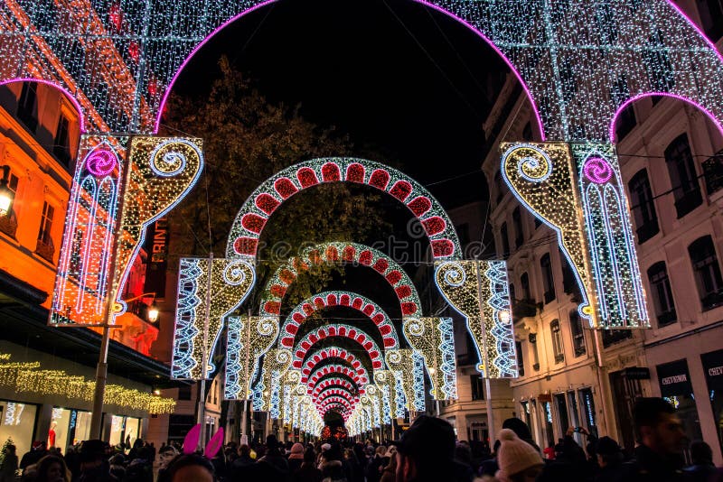 LYON, FRANCE - DECEMBER 6, 2014: street view of Festival of Lights in Lyon, France. The origins of this festival, named Fete des Lumieres, date to 1643. LYON, FRANCE - DECEMBER 6, 2014: street view of Festival of Lights in Lyon, France. The origins of this festival, named Fete des Lumieres, date to 1643.