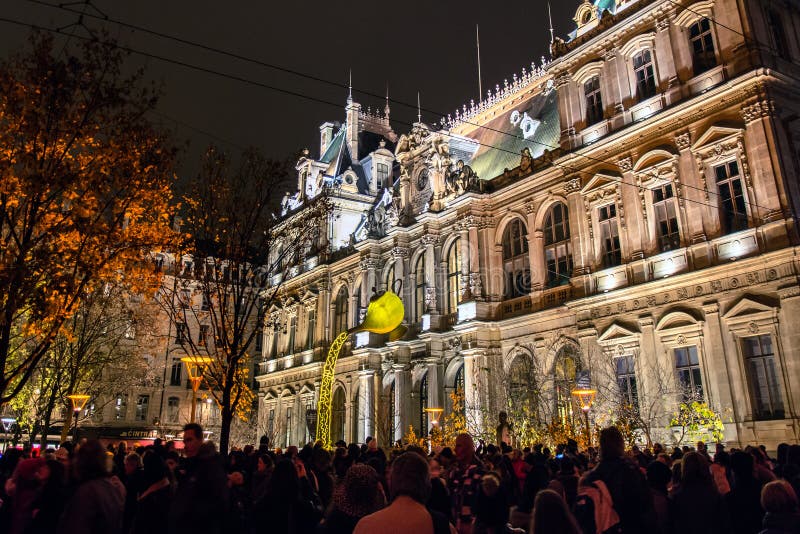 LYON, FRANCE - DECEMBER 6, 2014: street view of Festival of Lights in Lyon, France. The origins of this festival, named Fete des Lumieres, date to 1643. LYON, FRANCE - DECEMBER 6, 2014: street view of Festival of Lights in Lyon, France. The origins of this festival, named Fete des Lumieres, date to 1643.