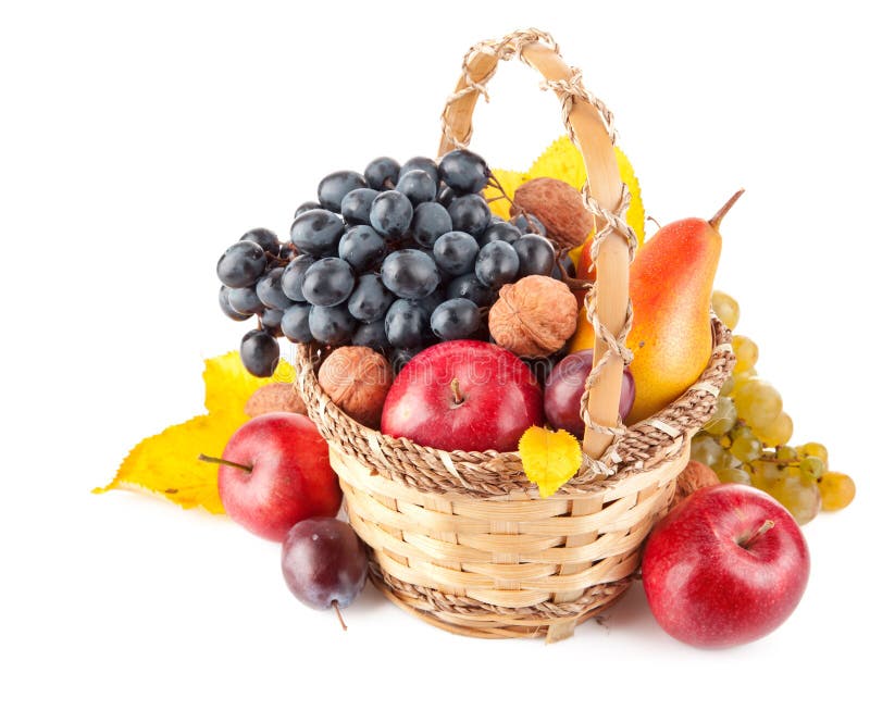 Autumnal fruit in basket on white background. Autumnal fruit in basket on white background