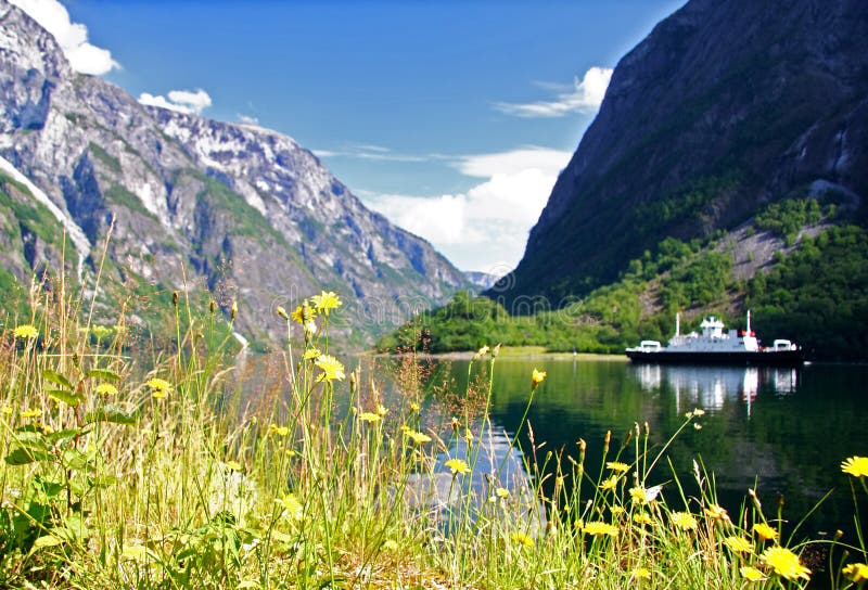 Ship on Naeroeyfjorden - a part of Sognefjorden, Norway. Unesco World Heritage site. Summer. Ship on Naeroeyfjorden - a part of Sognefjorden, Norway. Unesco World Heritage site. Summer.