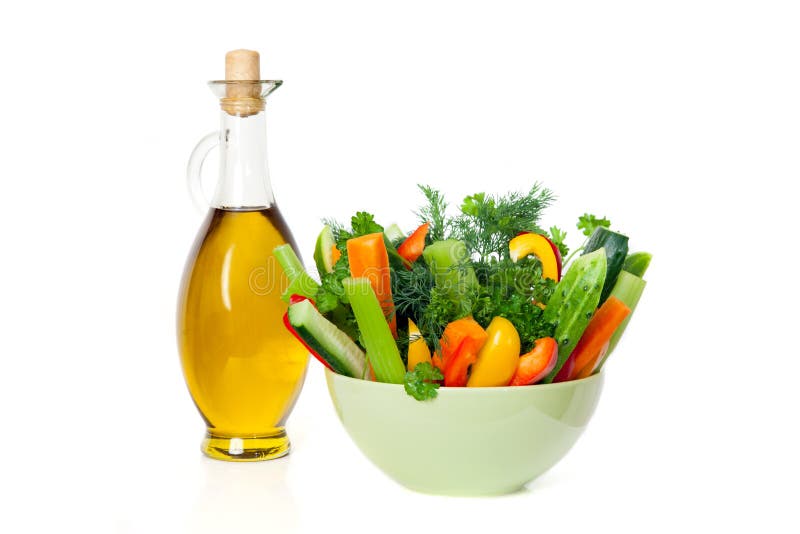 Olive oil and fresh vegetables isolated on white background. Olive oil and fresh vegetables isolated on white background