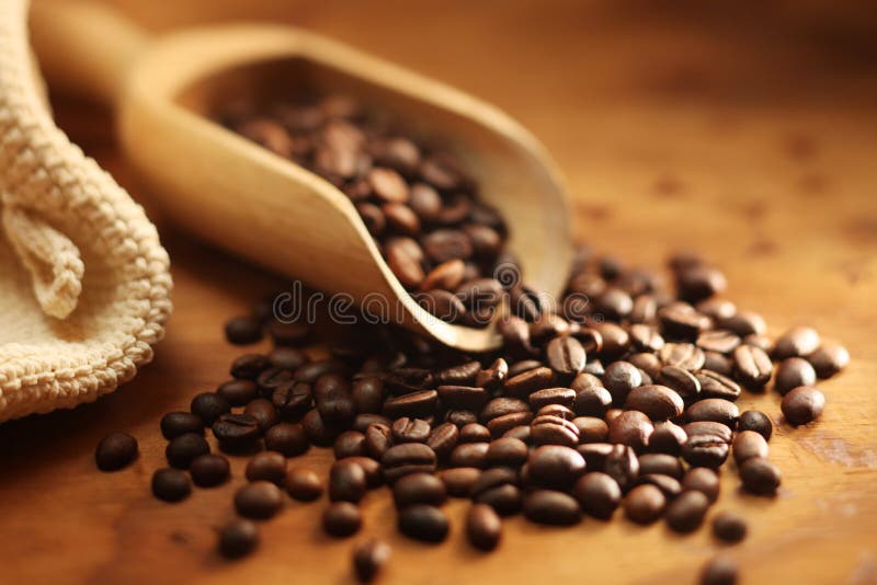 Poured fresh coffee bean on close up. Poured fresh coffee bean on close up