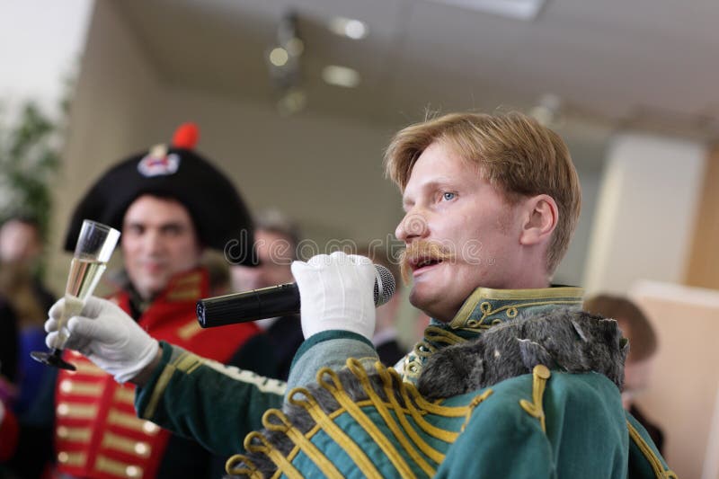 The russian hussar speaking toast on a holiday. The russian hussar speaking toast on a holiday