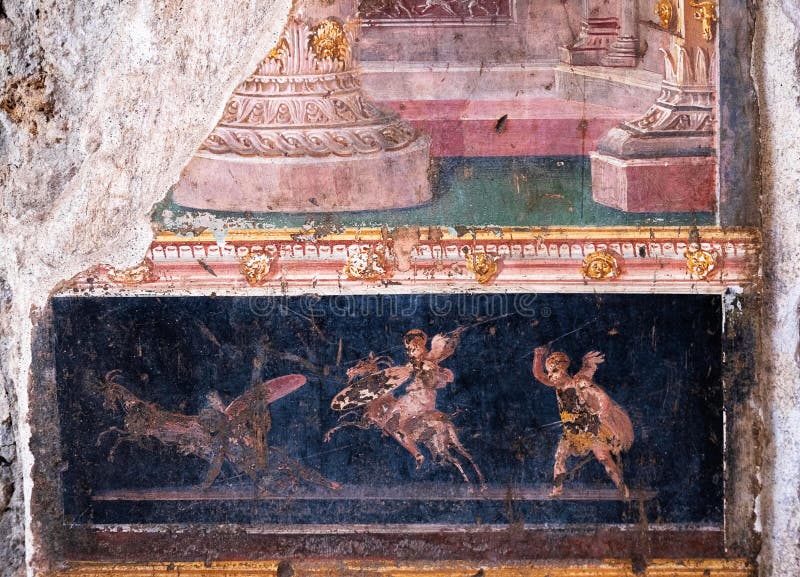 Φτερωτή πάλη cupids, μικροί Θεοί της αρχαίας Ρώμης στην Πομπηία στοκ φωτογραφίες με δικαίωμα ελεύθερης χρήσης Φτερωτή πάλη cupids, μικροί Θεοί της αρχαίας Ρώμης στην Πομπηία στοκ φωτογραφίες με δικαίωμα ελεύθερης χρήσης