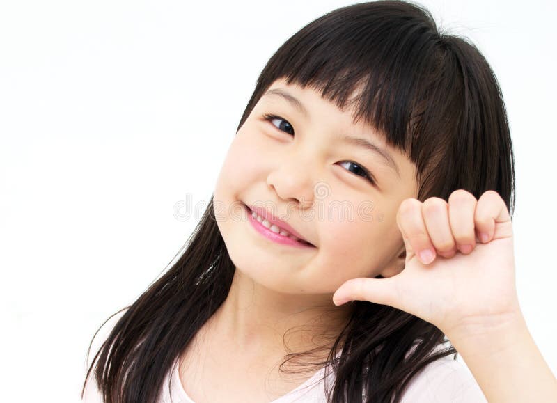 Smiling Excited Young Girl Number 1 Hand Gesture. Smiling Excited Young Girl Number 1 Hand Gesture