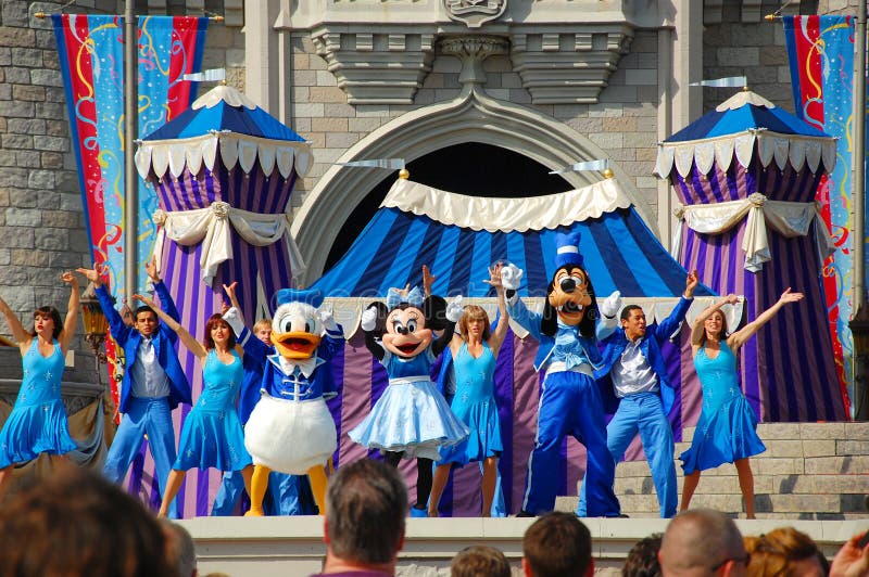 The leading characters of Disney Mickey, Minnie, Goofy and Donald are on stage during the Dreams Come True magical show in Magic Kingdom, Orlando. The leading characters of Disney Mickey, Minnie, Goofy and Donald are on stage during the Dreams Come True magical show in Magic Kingdom, Orlando.