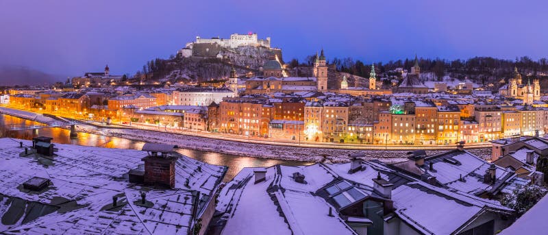 Salzburg old city at christmas time, snowy in the evening, Austria magic panorama advent alps landscape austrian castle building winter cathedral baroque church medieval europe fortress holiday trip rooftop dusk landmark light mountain night lights skyline tourism town travel unesco vacation view hohensalzburg historic river salzach sightseeing postcard idyll. Salzburg old city at christmas time, snowy in the evening, Austria magic panorama advent alps landscape austrian castle building winter cathedral baroque church medieval europe fortress holiday trip rooftop dusk landmark light mountain night lights skyline tourism town travel unesco vacation view hohensalzburg historic river salzach sightseeing postcard idyll