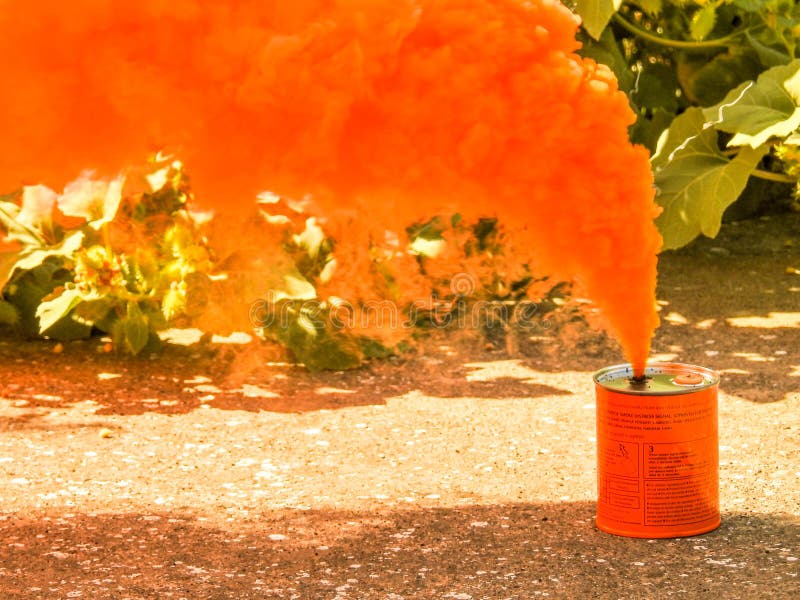 A bright orange smoke grenade used to signal in the event of rescue or to show a position from far away. A bright orange smoke grenade used to signal in the event of rescue or to show a position from far away.