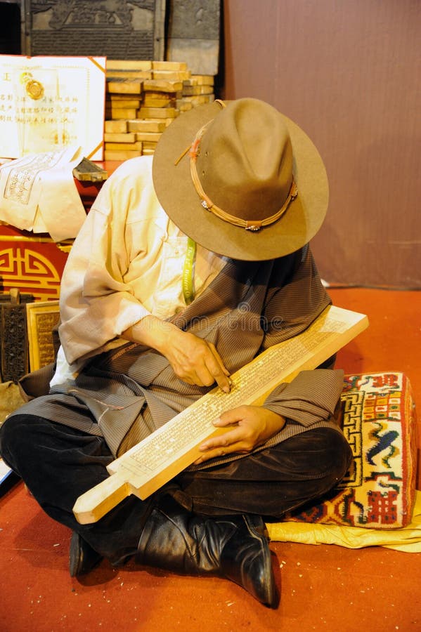 Block Carving,as early as 1,000 years ago,Tibetan people have already started printing sutras with engraved blocks. The 12th Western China International Fair ,October 18th-22th,2011.in chengdu,sichuan,china. Block Carving,as early as 1,000 years ago,Tibetan people have already started printing sutras with engraved blocks. The 12th Western China International Fair ,October 18th-22th,2011.in chengdu,sichuan,china.