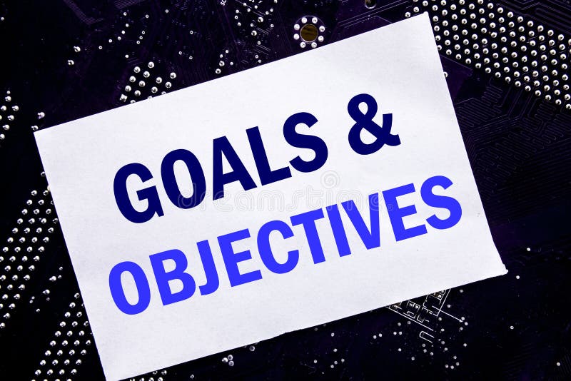 Handwritten text showing Goals Objectives. Business concept for Plan Success Vision Written on sticky, computer main board background. Handwritten text showing Goals Objectives. Business concept for Plan Success Vision Written on sticky, computer main board background.