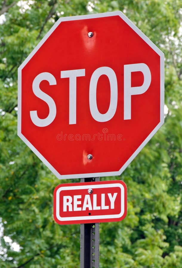 A humorous stop sign, warning drivers to REALLY stop!. A humorous stop sign, warning drivers to REALLY stop!