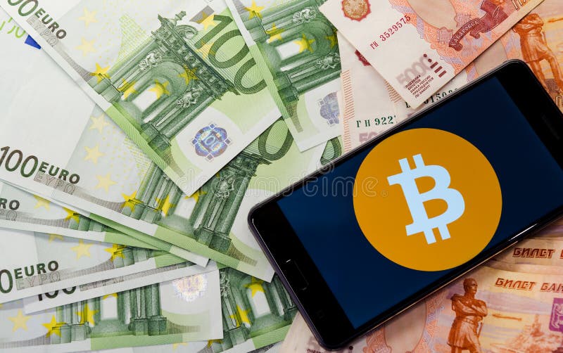 Χρήματα και bitcon σε έναν φάκελο στοκ φωτογραφία με δικαίωμα ελεύθερης χρήσης Χρήματα και bitcon σε έναν φάκελο στοκ φωτογραφία με δικαίωμα ελεύθερης χρήσης