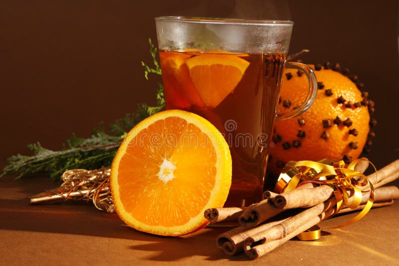 Christmas drink with orange and cinnamon. Christmas drink with orange and cinnamon