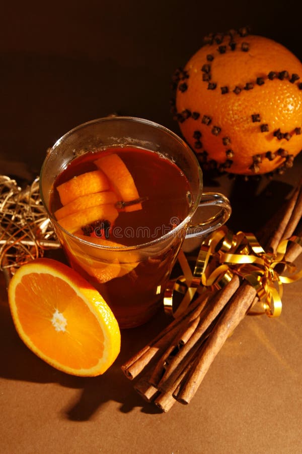 Christmas drink with cinnamon and orange. Christmas drink with cinnamon and orange