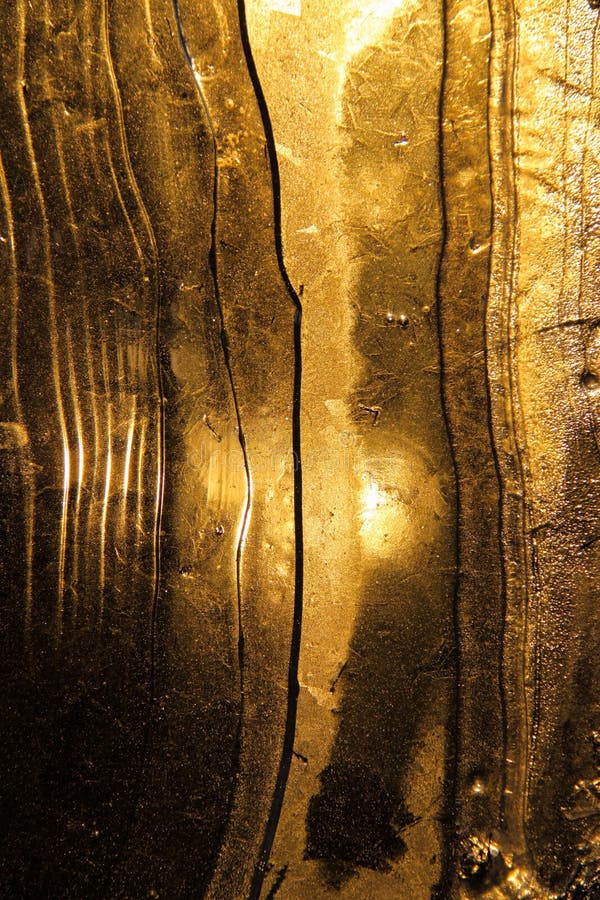 Χρυσό shimmer στον πάγο. στοκ εικόνες