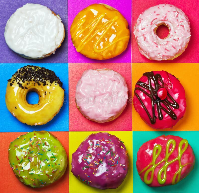 Χρωματισμένος βερνικωμένος donuts στοκ εικόνα με δικαίωμα ελεύθερης χρήσης Χρωματισμένος βερνικωμένος donuts στοκ εικόνα με δικαίωμα ελεύθερης χρήσης