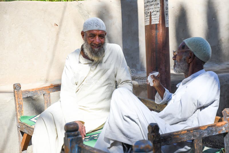 Nubian villagers sitting outside and waiting for the wedding banquet, Aswan, Egypt, Africa. In the nubian wedding banquet, men and women celebrate separately. Nubian Nubians is a member of Sultan in northeastern Africa. Others are distributed in southern Egypt. Nubian villagers sitting outside and waiting for the wedding banquet, Aswan, Egypt, Africa. In the nubian wedding banquet, men and women celebrate separately. Nubian Nubians is a member of Sultan in northeastern Africa. Others are distributed in southern Egypt.