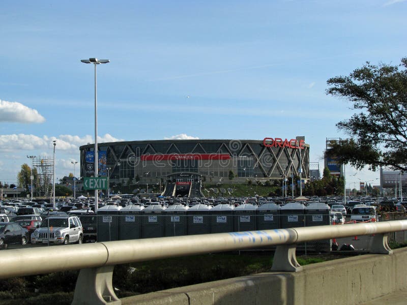 Cars parked in lot at Oracle Arena in Oakland, California before a Raider's NFL football game. Cars parked in lot at Oracle Arena in Oakland, California before a Raider's NFL football game.