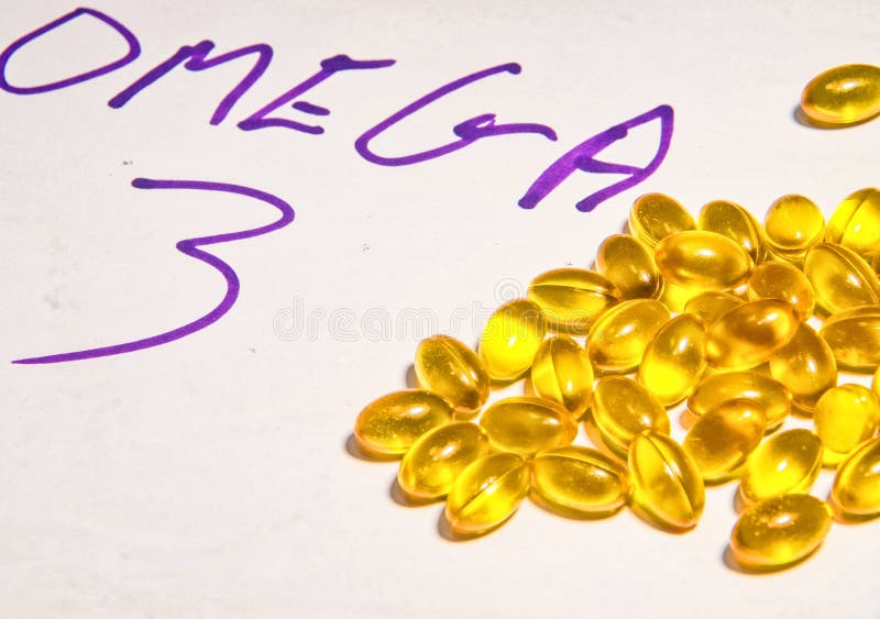 close up photo of omega 3 capsules. close up photo of omega 3 capsules