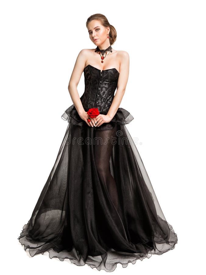 Beautiful Woman In Black Evening Gown holding Red Rose, Full Length Vintage Fashion Corset Chiffon Dress over Cut Out Background. Beautiful Woman In Black Evening Gown holding Red Rose, Full Length Vintage Fashion Corset Chiffon Dress over Cut Out Background