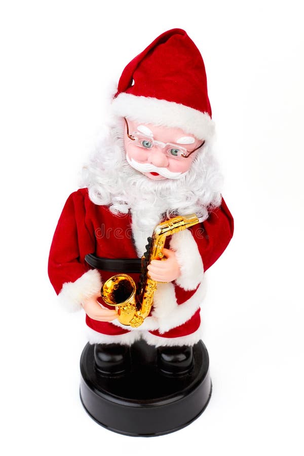 Όμορφο παιχνίδι Άγιου Βασίλη με το saxophone στοκ εικόνα με δικαίωμα ελεύθερης χρήσης Όμορφο παιχνίδι Άγιου Βασίλη με το saxophone στοκ εικόνα με δικαίωμα ελεύθερης χρήσης