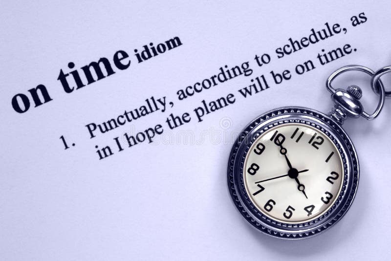 Pocket watch and definition of beging on time, concept analogy for punctuality. Pocket watch and definition of beging on time, concept analogy for punctuality.